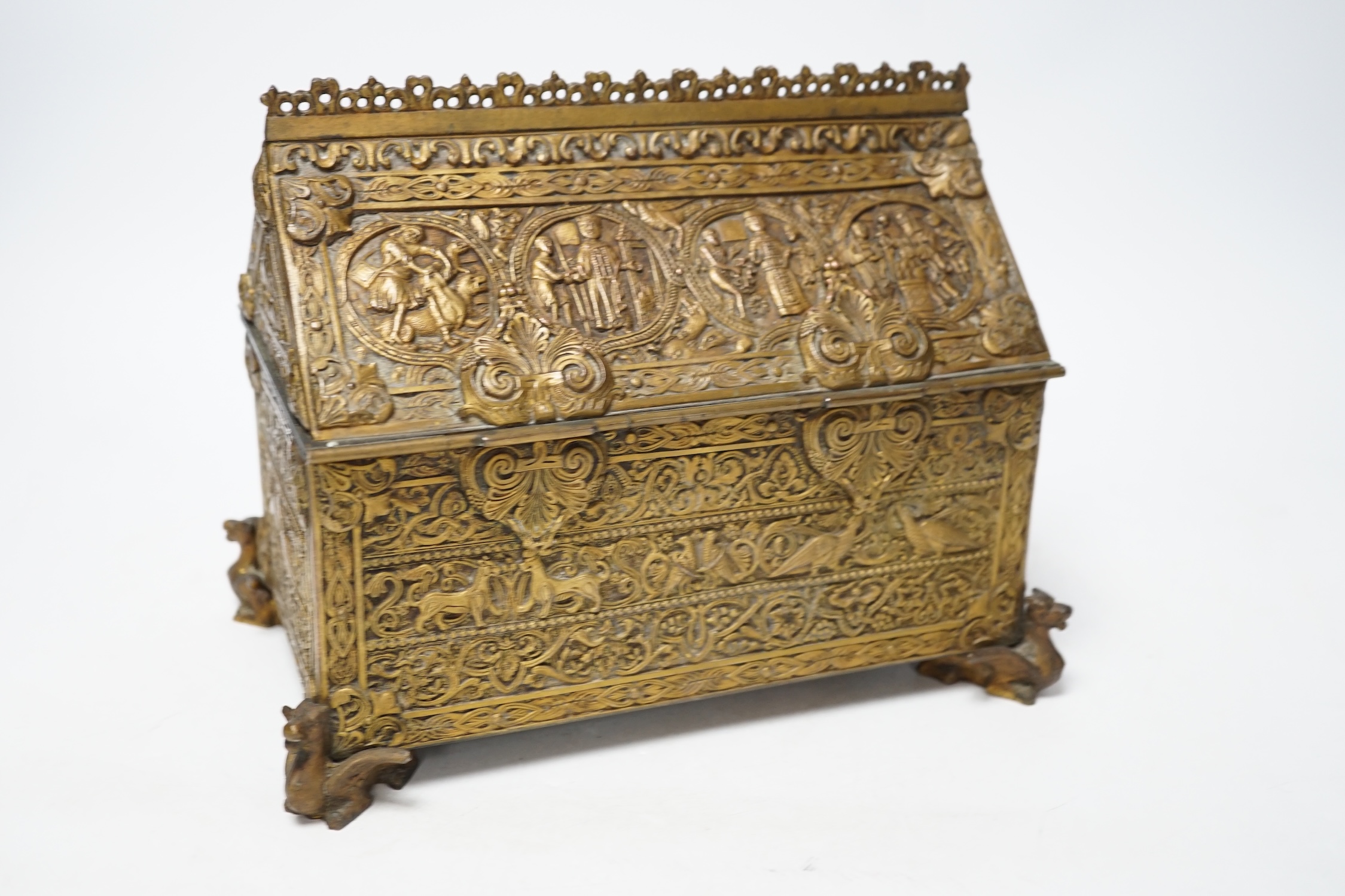 A late 19th century French Gothic revival embossed brass casket, 23cm